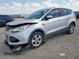 2014 Ford Escape SE with VIN 1FMCU0G90EUB02223, listed as a Copart auction lot 85125095 with 121,982 mi miles and Salvage title. Bid and sale history available at DreamBid. Image 1.