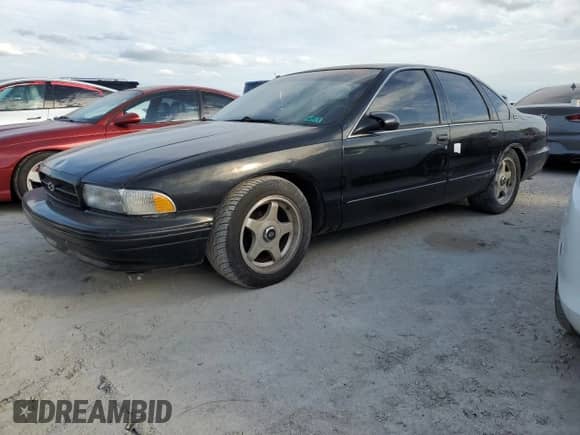 1995 Chevrolet Caprice с VIN 1G1BL52P9SR126730, выставлен на аукционе Copart как лот 75273934 с пробегом Не указан миль и Списание • Salvage title. История ставок и продаж доступна на DreamBid. Изображение 1.