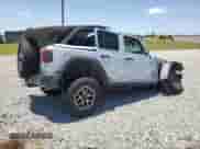 2024 Jeep Wrangler Rubicon with VIN 1C4PJXFG6RW263774, listed as a Copart auction lot 57766925 with 19,429 mi miles and Non repairable. Bid and sale history available at DreamBid. Image 3.