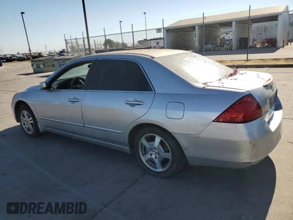 2007 Honda Accord LX SE with VIN 1HGCM55307A125412, listed as a Copart auction lot 65572495 with 230,048 mi miles and Salvage title. Bid and sale history available at DreamBid. Image 2.
