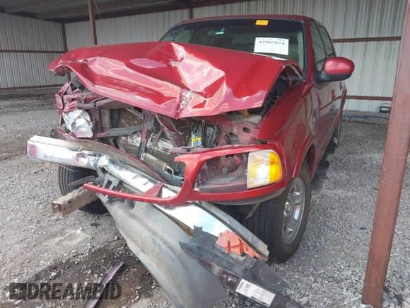 2002 Ford F-150 XLT z VIN 1FTRW07682KB93618, wystawiony jako IAAI lot #42987874 z przebiegiem Nie podano mil oraz . Historia ofert i sprzedaży dostępna na DreamBid. Obrazek 6.