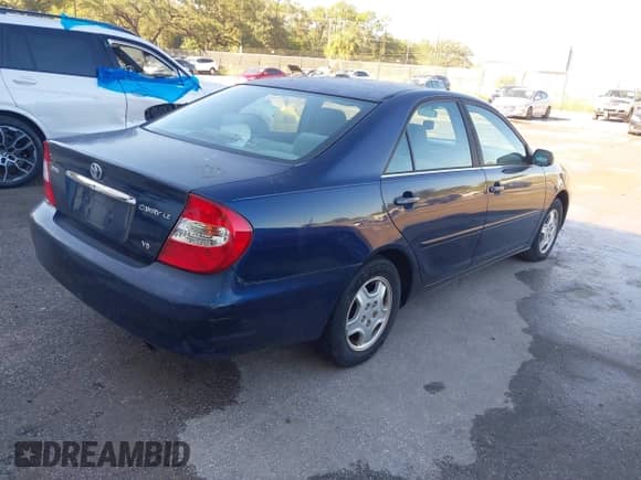 2002 Toyota Camry XLE с VIN 4T1BF32K62U511257, выставлен на аукционе IAAI как лот 43451080 с пробегом 147 569 миль миль и . История ставок и продаж доступна на DreamBid. Изображение 4.