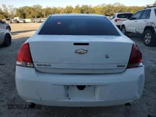 2012 Chevrolet Impala Police Police with VIN 2G1WD5E37C1323042, listed as a Copart auction lot 87278824 with Not provided miles and Salvage title. Bid and sale history available at DreamBid. Image 6.