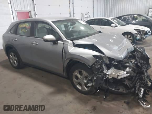 2024 Honda HR-V LX z VIN 3CZRZ2H31RM756478, wystawiony jako IAAI lot #42372882 z przebiegiem 10 166 mil mil oraz . Historia ofert i sprzedaży dostępna na DreamBid. Obrazek 1.