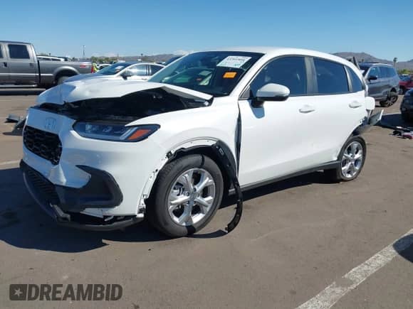2025 Honda HR-V LX with VIN 3CZRZ2H31SM760424, listed as a IAAI auction lot 43301804 with 13,447 mi miles and . Bid and sale history available at DreamBid. Image 2.