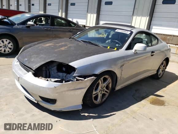 2006 Hyundai Tiburon GT с VIN KMHHN65F76U216025, выставлен на аукционе Copart как лот 74443474 с пробегом 139 626 миль миль и На запчасти • Non repairable. История ставок и продаж доступна на DreamBid. Изображение 9.