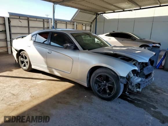 2012 Dodge Charger SE with VIN 2C3CDXBG8CH287306, listed as a Copart auction lot 84903545 with 203,624 mi miles and Salvage title. Bid and sale history available at DreamBid. Image 4.