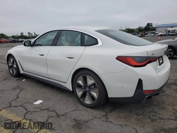 2024 BMW i4 xDrive40 с VIN WBY83FB04RFT01096, выставлен на аукционе Copart как лот 61055045 с пробегом 1 370 миль миль и Списание • Salvage title. История ставок и продаж доступна на DreamBid. Изображение 2.