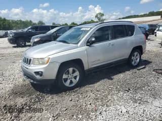 2011 Jeep Compass z VIN 1J4NT1FA9BD236624, wystawiony jako Copart lot #64234235 z przebiegiem 127 944 mil mil oraz Szkoda całkowita • Salvage title. Historia ofert i sprzedaży dostępna na DreamBid. Obrazek 1.