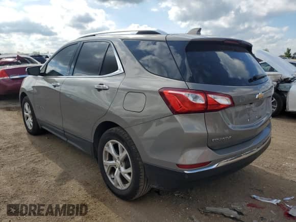 2018 Chevrolet Equinox Premier z VIN 3GNAXMEV8JS531458, wystawiony jako Copart lot #69405575 z przebiegiem 112 739 mil mil oraz Szkoda całkowita • Salvage title. Historia ofert i sprzedaży dostępna na DreamBid. Obrazek 2.