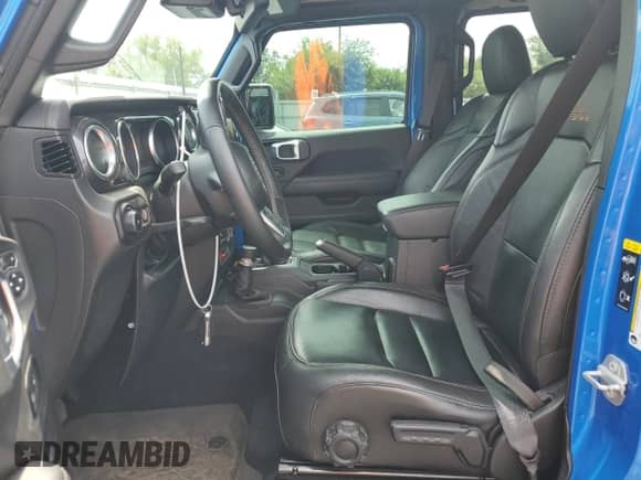 2023 Jeep Wrangler Rubicon 20th Anniversary with VIN 1C4JJXSJ4PW546713, listed as a Copart auction lot 68812855 with 19,897 mi miles and Salvage title. Bid and sale history available at DreamBid. Image 7.