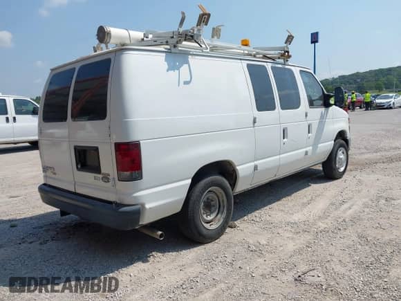 2012 Ford Econoline Cargo Commercial with VIN 1FTNE1EW0CDB13390, listed as a IAAI auction lot 42899058 with 119,855 mi miles and . Bid and sale history available at DreamBid. Image 4.