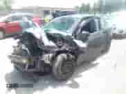 2012 Chevrolet Sonic LT with VIN 1G1JD5SH4C4197415, listed as a IAAI auction lot 42558061 with 142,175 mi miles and . Bid and sale history available at DreamBid. Image 2.