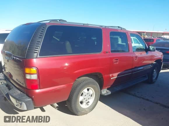 2002 Chevrolet Suburban LT z VIN 1GNEC16Z02J229078, wystawiony jako IAAI lot #41737482 z przebiegiem 306 502 mil mil oraz . Historia ofert i sprzedaży dostępna na DreamBid. Obrazek 4.