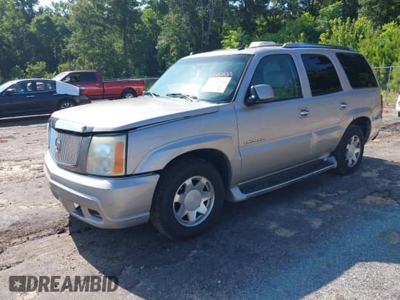 2004 Cadillac Escalade with VIN 1GYEC63T64R257729, listed as a IAAI auction lot 42682633 with 204,439 mi miles and . Bid and sale history available at DreamBid. Image 2.