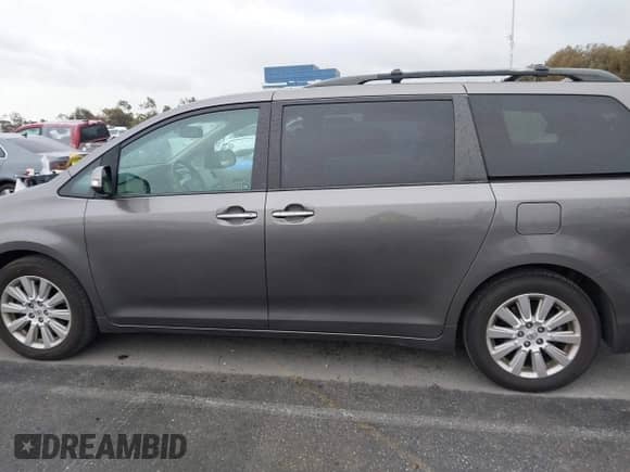 2013 Toyota Sienna XLE with VIN 5TDDK3DCXDS059061, listed as a IAAI auction lot 41777329 with 142,889 mi miles and . Bid and sale history available at DreamBid. Image 14.