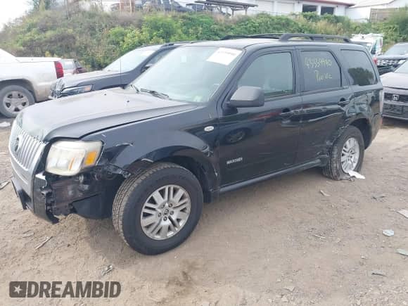 2008 Mercury Mariner with VIN 4M2CU91108KJ51427, listed as a IAAI auction lot 43339990 with 227,044 mi miles and . Bid and sale history available at DreamBid. Image 17.