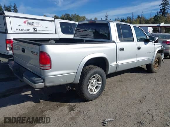 2002 Dodge Dakota Sport with VIN 1B7HG38N32S544337, listed as a IAAI auction lot 43470577 with 267,746 mi miles and . Bid and sale history available at DreamBid. Image 4.