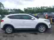 2020 Hyundai Tucson Value z VIN KM8J33A40LU232489, wystawiony jako IAAI lot #42941316 z przebiegiem 27 559 mil mil oraz . Historia ofert i sprzedaży dostępna na DreamBid. Obrazek 13.