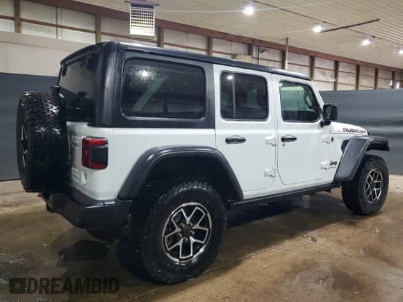 2024 Jeep Wrangler Rubicon with VIN 1C4PJXFG3RW300831, listed as a Copart auction lot 82029925 with 29,328 mi miles and Clean title. Bid and sale history available at DreamBid. Image 3.