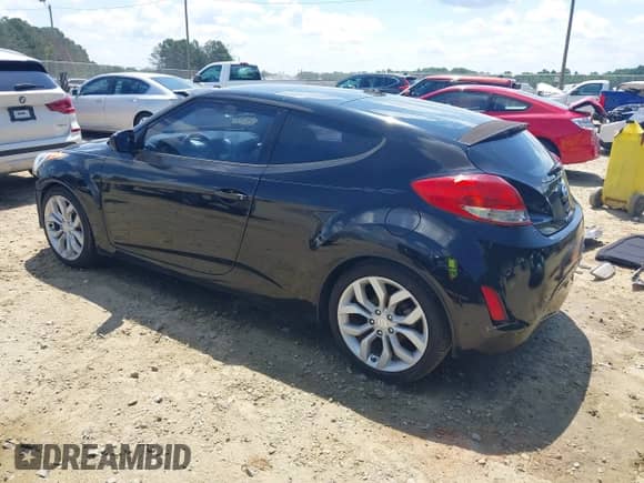2012 Hyundai Veloster w/Black Int с VIN KMHTC6AD0CU056828, выставлен на аукционе IAAI как лот 42611623 с пробегом 136 242 миль миль и . История ставок и продаж доступна на DreamBid. Изображение 3.