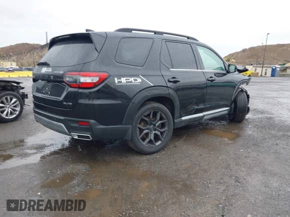 2023 Honda Pilot Elite с VIN 5FNYG1H89PB030270, выставлен на аукционе IAAI как лот 42256690 с пробегом 27 035 миль миль и . История ставок и продаж доступна на DreamBid. Изображение 4.