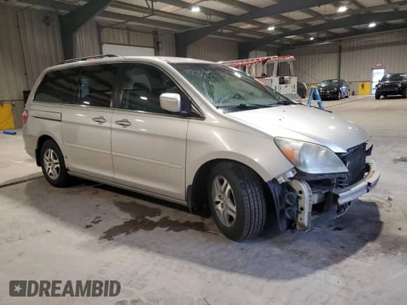 2006 Honda Odyssey EX z VIN 5FNRL38466B459017, wystawiony jako Copart lot #82309125 z przebiegiem 215 922 mil mil oraz Szkoda całkowita • Salvage title. Historia ofert i sprzedaży dostępna na DreamBid. Obrazek 4.