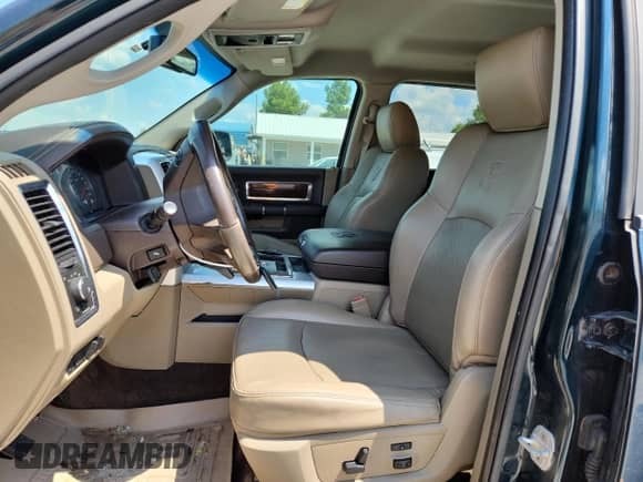 2011 Ram 1500 Laramie with VIN 1D7RV1CT1BS570882, listed as a Copart auction lot 69460135 with 216,043 mi miles and Salvage title. Bid and sale history available at DreamBid. Image 7.