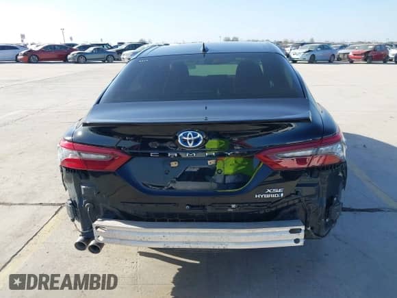 2022 Toyota Camry Hybrid XSE z VIN 4T1K31AK4NU579480, wystawiony jako IAAI lot #41709133 z przebiegiem 66 968 mil mil oraz . Historia ofert i sprzedaży dostępna na DreamBid. Obrazek 17.