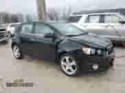 2014 Chevrolet Sonic LTZ with VIN 1G1JE6SB0E4177132, listed as a Copart auction lot 47232635 with 118,512 mi miles and Clean title. Bid and sale history available at DreamBid. Image 4.