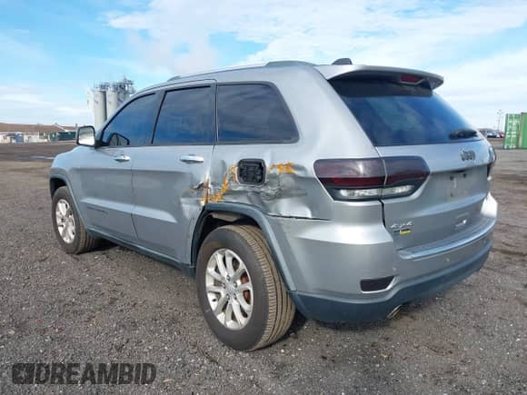 2014 Jeep Grand Cherokee Limited with VIN 1C4RJFBG5EC273488, listed as a IAAI auction lot 43390401 with 120,575 mi miles and . Bid and sale history available at DreamBid. Image 6.