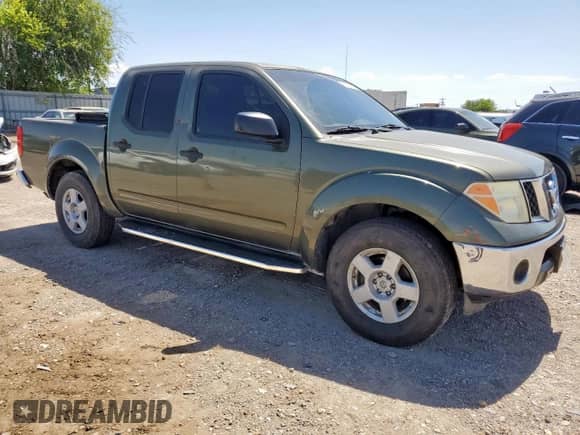 2005 Nissan Frontier SE with VIN 1N6AD07U15C402856, listed as a Copart auction lot 65883815 with 130,400 mi miles and Salvage title. Bid and sale history available at DreamBid. Image 4.