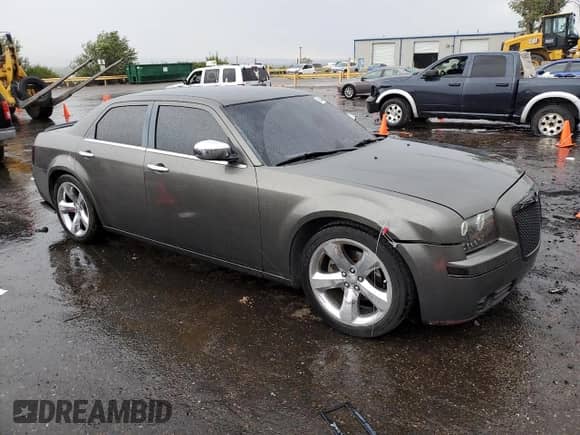 2010 Chrysler 300 Touring с VIN 2C3CA5CV4AH164898, выставлен на аукционе Copart как лот 65441825 с пробегом 179 354 миль миль и Списание • Salvage title. История ставок и продаж доступна на DreamBid. Изображение 4.