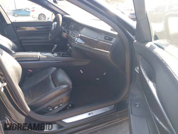 2012 BMW 7 Series 750i with VIN WBAKA8C52CDX01483, listed as a IAAI auction lot 42626956 with 168,729 mi miles and . Bid and sale history available at DreamBid. Image 5.