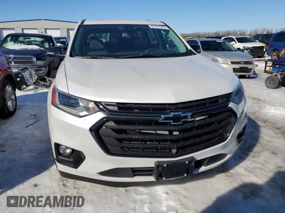 2021 Chevrolet Traverse Premier с VIN 1GNEVKKW4MJ238428, выставлен на аукционе Copart как лот 87751075 с пробегом 44 501 миль миль и Списание • Salvage title. История ставок и продаж доступна на DreamBid. Изображение 5.