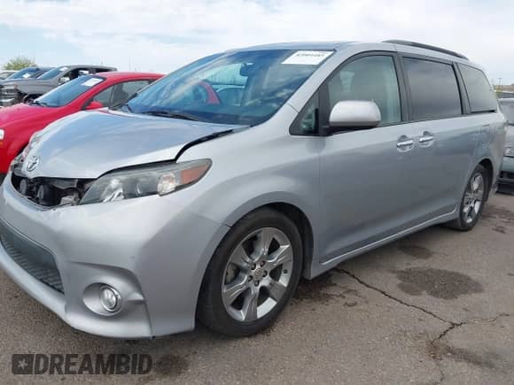 2014 Toyota Sienna SE with VIN 5TDXK3DC4ES491269, listed as a IAAI auction lot 42004485 with 118,516 mi miles and . Bid and sale history available at DreamBid. Image 2.