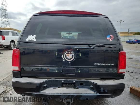 2002 Cadillac Escalade z VIN 1GYEC63T52R307405, wystawiony jako Copart lot #85707005 z przebiegiem 229 354 mil mil oraz Szkoda całkowita • Salvage title. Historia ofert i sprzedaży dostępna na DreamBid. Obrazek 6.