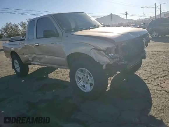 1997 Toyota Tacoma z VIN 4TAWM72NXVZ328170, wystawiony jako Copart lot #81649744 z przebiegiem 171 620 mil mil oraz Szkoda całkowita • Salvage title. Historia ofert i sprzedaży dostępna na DreamBid. Obrazek 11.