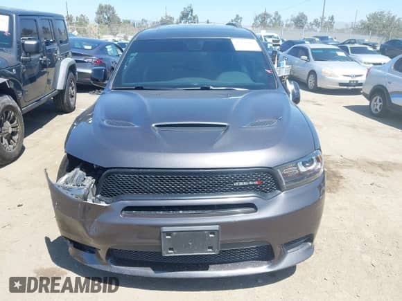 2018 Dodge Durango GT with VIN 1C4RDHDG7JC494195, listed as a IAAI auction lot 43097393 with 63,884 mi miles and . Bid and sale history available at DreamBid. Image 12.