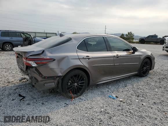 2023 Toyota Camry Hybrid XSE с VIN 4T1K31AK5PU056309, выставлен на аукционе Copart как лот 70047455 с пробегом 31 242 миль миль и Списание • Salvage title. История ставок и продаж доступна на DreamBid. Изображение 3.