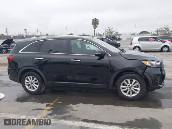 2020 Kia Sorento LX with VIN 5XYPG4A35LG638222, listed as a IAAI auction lot 42447105 with 61,929 mi miles and . Bid and sale history available at DreamBid. Image 13.