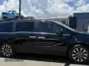 2024 Honda Odyssey EX-L with VIN 5FNRL6H68RB018609, listed as a IAAI auction lot 43349619 with 15,445 mi miles and . Bid and sale history available at DreamBid. Image 6.