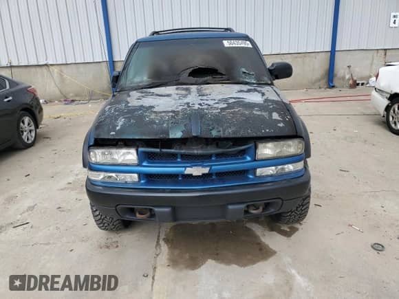 2001 Chevrolet Blazer LS z VIN 1GNCT18W61K158519, wystawiony jako Copart lot #50435495 z przebiegiem Nie podano mil oraz Nie do naprawy • Non repairable. Historia ofert i sprzedaży dostępna na DreamBid. Obrazek 5.