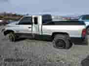 1998 Dodge 2500 with VIN 1B7KF23D1WJ131443, listed as a Copart auction lot 86404184 with 303,655 mi miles and Salvage title. Bid and sale history available at DreamBid. Image 2.