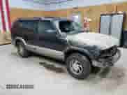 2000 Chevrolet Blazer LT с VIN 1GNDT13W0Y2221121, выставлен на аукционе Copart как лот 70241964 с пробегом Не указан миль и Чистый • Clean title. История ставок и продаж доступна на DreamBid. Изображение 4.