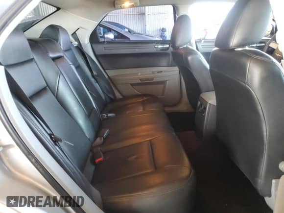 2007 Chrysler 300 with VIN 2C3KA43R37H785728, listed as a Copart auction lot 82369005 with 140,326 mi miles and Salvage title. Bid and sale history available at DreamBid. Image 10.