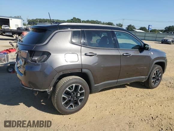 2019 Jeep Compass Trailhawk with VIN 3C4NJDDB2KT713400, listed as a Copart auction lot 84782185 with 63,337 mi miles and Salvage title. Bid and sale history available at DreamBid. Image 3.
