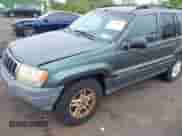 2003 Jeep Grand Cherokee Laredo with VIN 1J4GW48S23C610697, listed as a IAAI auction lot 43178617 with 227,331 mi miles and . Bid and sale history available at DreamBid. Image 2.