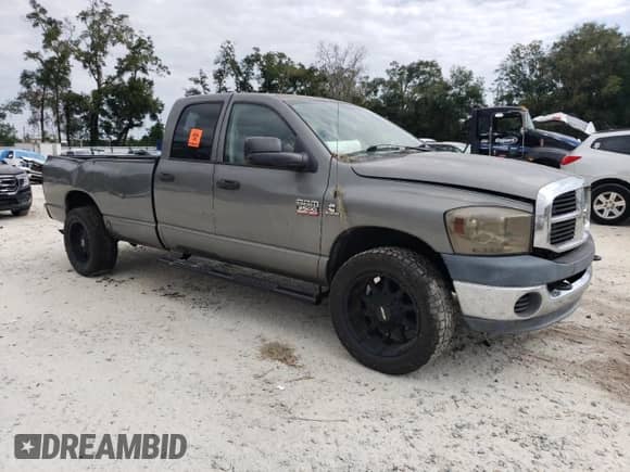 2007 Dodge 2500 SLT with VIN 3D7KR28C97G724516, listed as a Copart auction lot 71608014 with 247,245 mi miles and Salvage title. Bid and sale history available at DreamBid. Image 4.