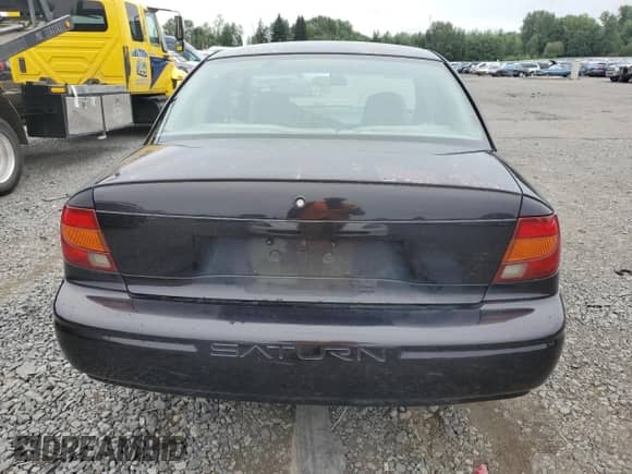 2000 Saturn SL with VIN 1G8ZH528XYZ160128, listed as a Copart auction lot 64913404 with 172,587 mi miles and Clean title. Bid and sale history available at DreamBid. Image 6.